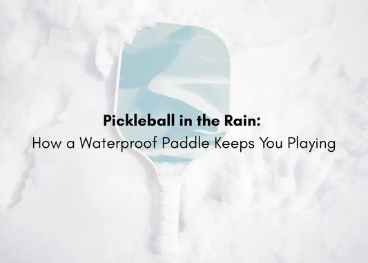 Player using a waterproof pickleball paddle in the rain