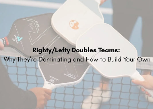 Right-handed and left-handed pickleball players high-fiving on a doubles court