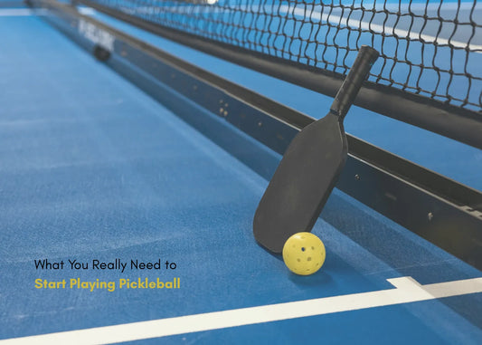 Pickleball starter kit with essential pickleball accessories for beginners, including paddles, balls, and a bag