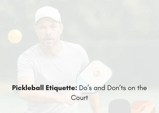 Players practicing good pickleball etiquette during a friendly match on an outdoor court